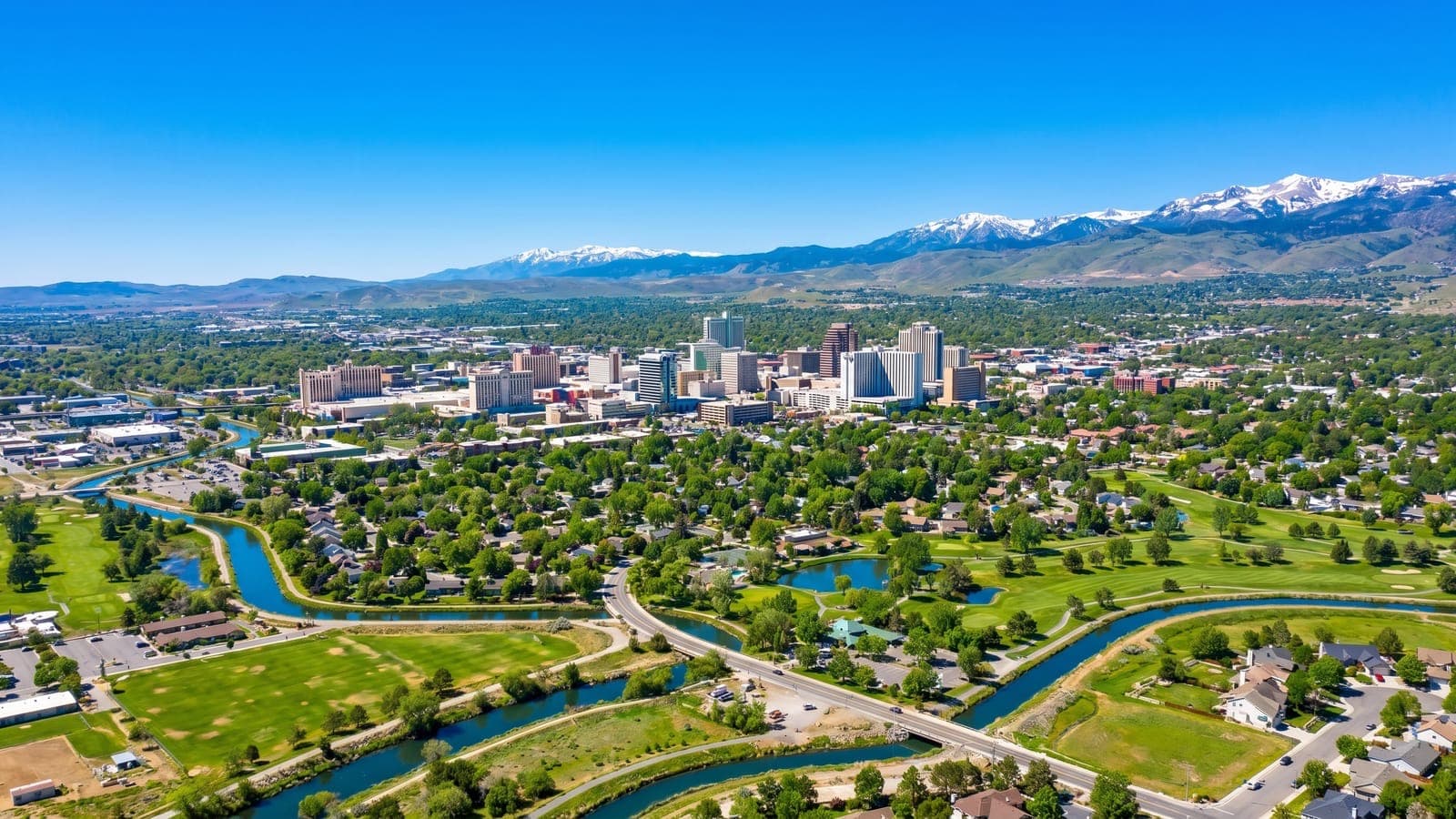 Reno, Nevada — downtown skyline and the Truckee Meadows beneath the Sierra Nevada