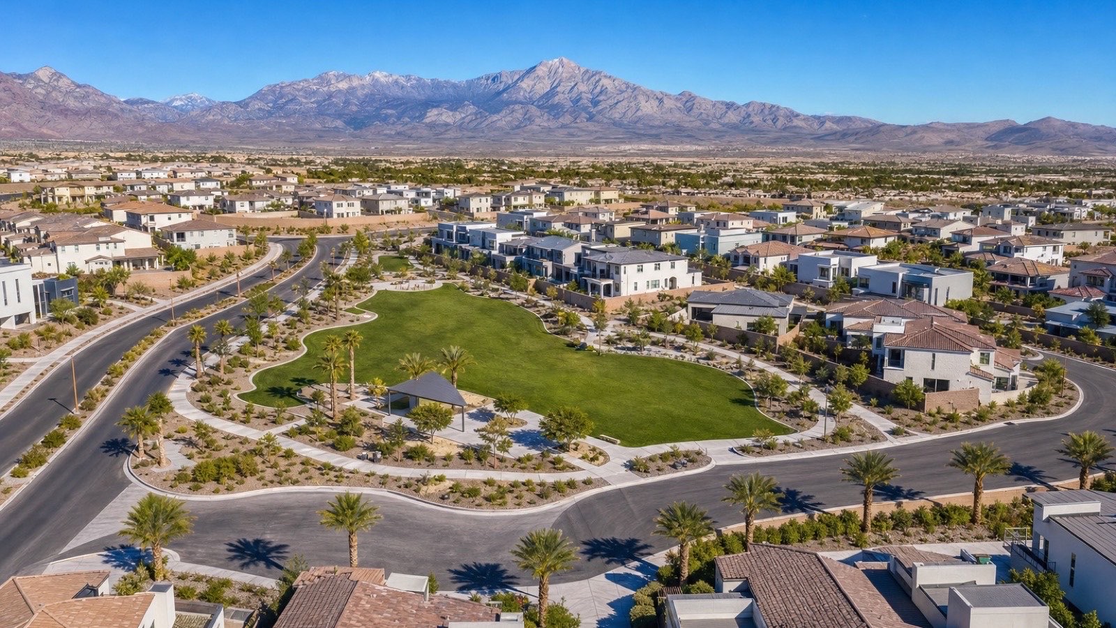 New-home streetscape in the Enterprise corridor of Southwest Las Vegas near Triad Springs 2026